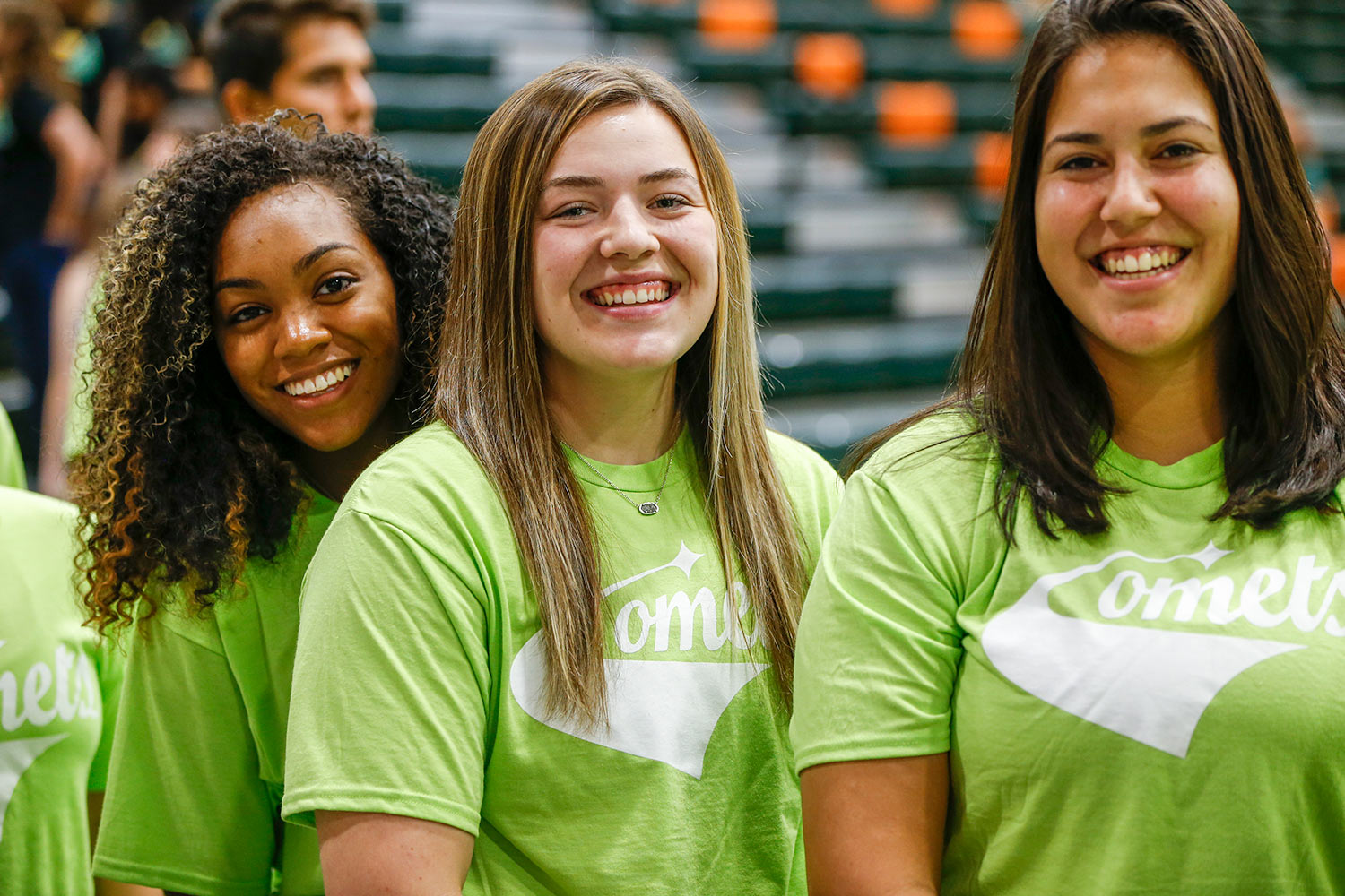 students wearing green Comets shirts