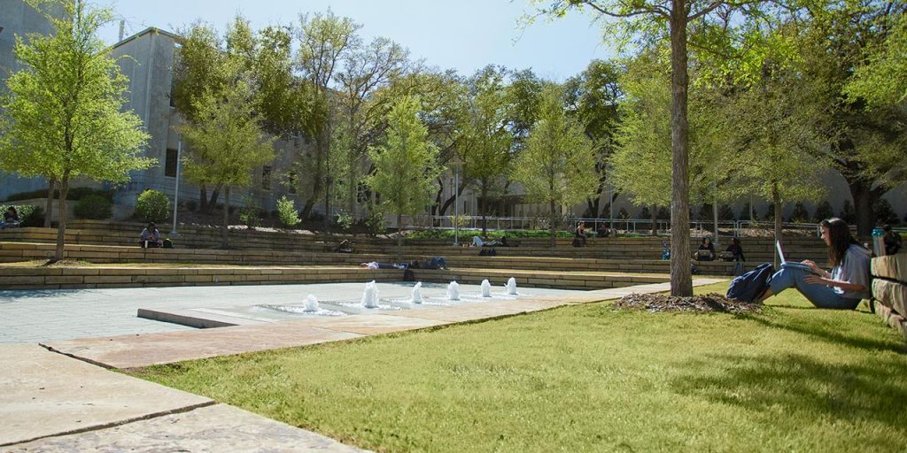 students studying at the TI Plaza